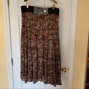 Brown print midi skirt with wide elastic belt by Metro Wear.